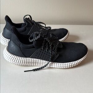 Adidas Black and White Athletic Shoes with Textured Midsole